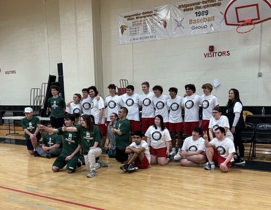 The Unified Basketball teams of BRHS and Ridge High School pose for a picture after the game.