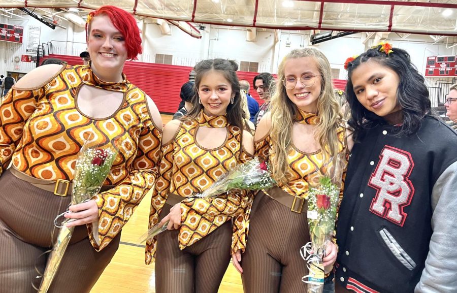The four BRHS seniors from left to right Anya Dolson, Alyssa Saums, Amanda Sullivan, and Kurt Joshua Echulese, receive flowers after their performance.