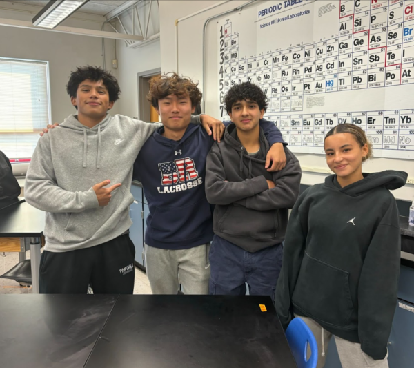 The officers of the fishing club: Derek Carranza, Jayden Lee, Shubh Kapoor, and Jade Tofte posing for a photo during the second meeting of the year.