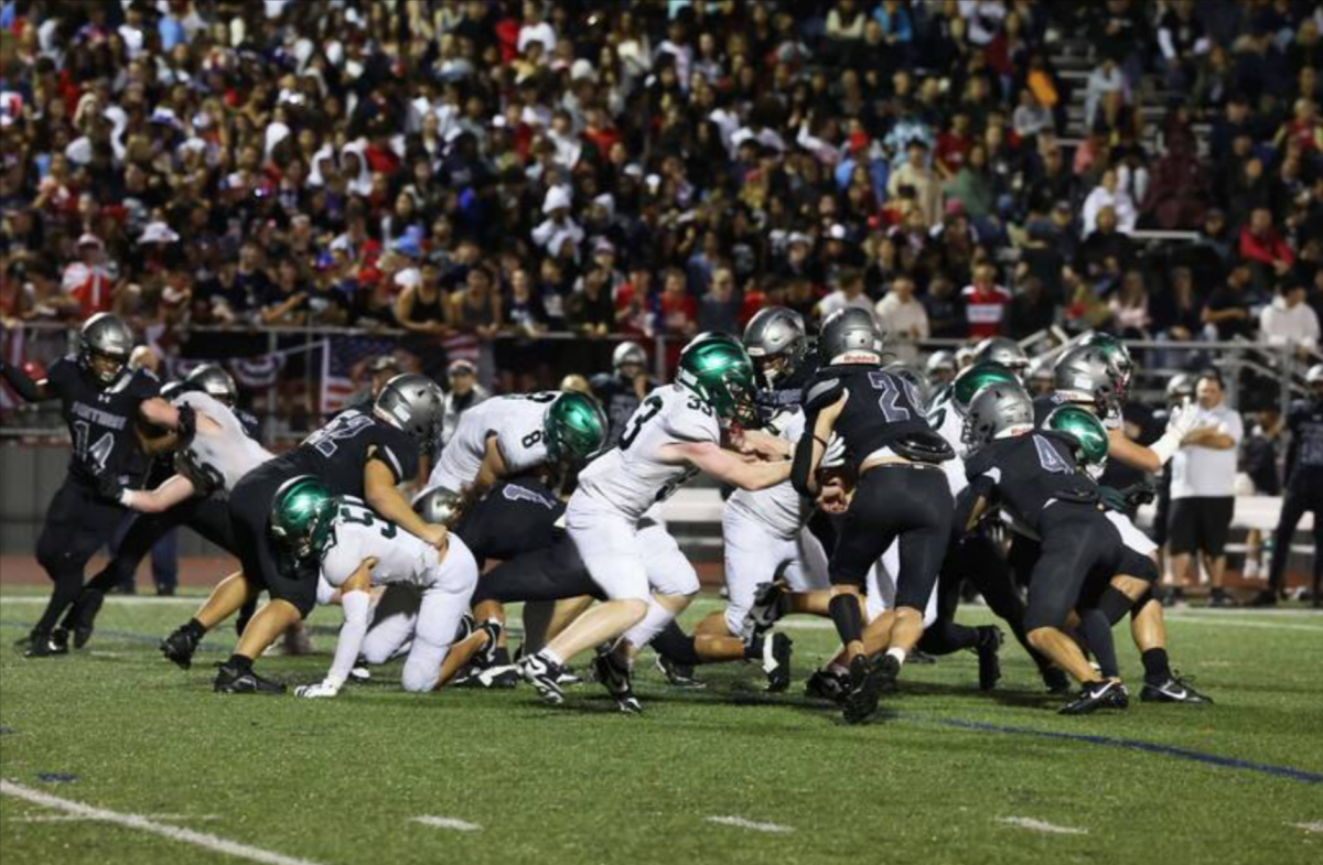 Football team defeated in Homecoming Game