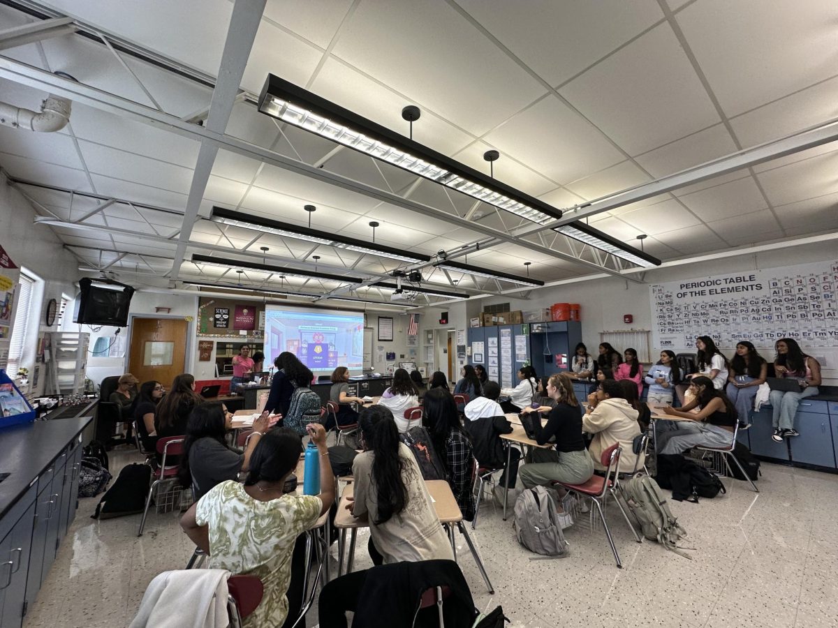 Students gather for the holiday meeting