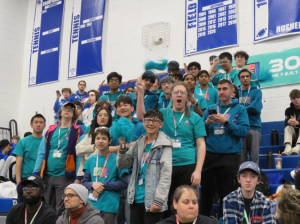 Team members cheered as their robot competed in the event.