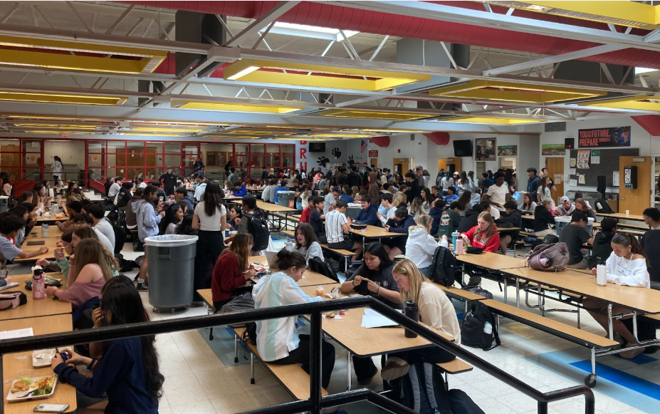 Students crowd in the large cafeteria during lunch every day.