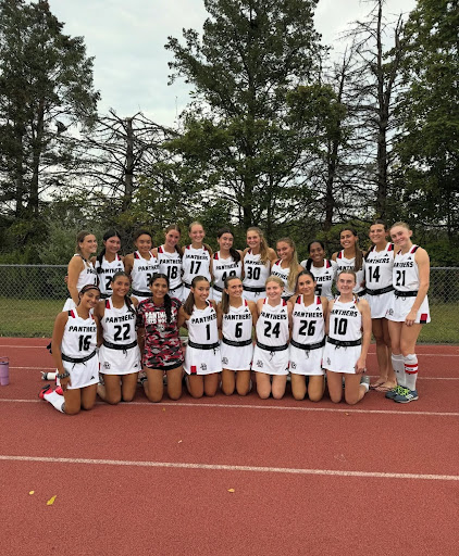 The Girls Varsity Hockey Team poses for a group picture. (BRHS Varsity Field Hockey Instagram)