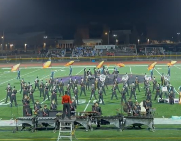 The marching band was named grand champion at the Monroe High School competition.