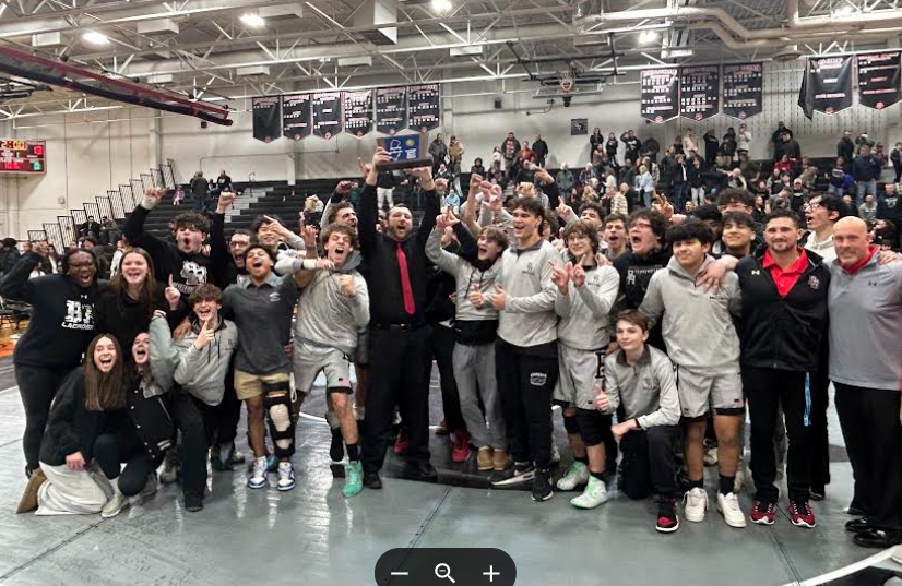 The wrestling team celebrated a huge win at the sectional championship
