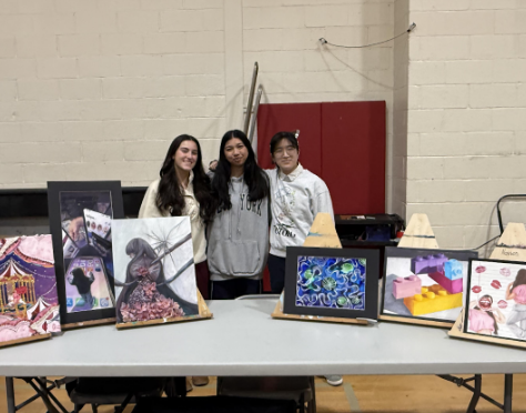 Many student volunteers helped set up tables and stands for their respective electives.